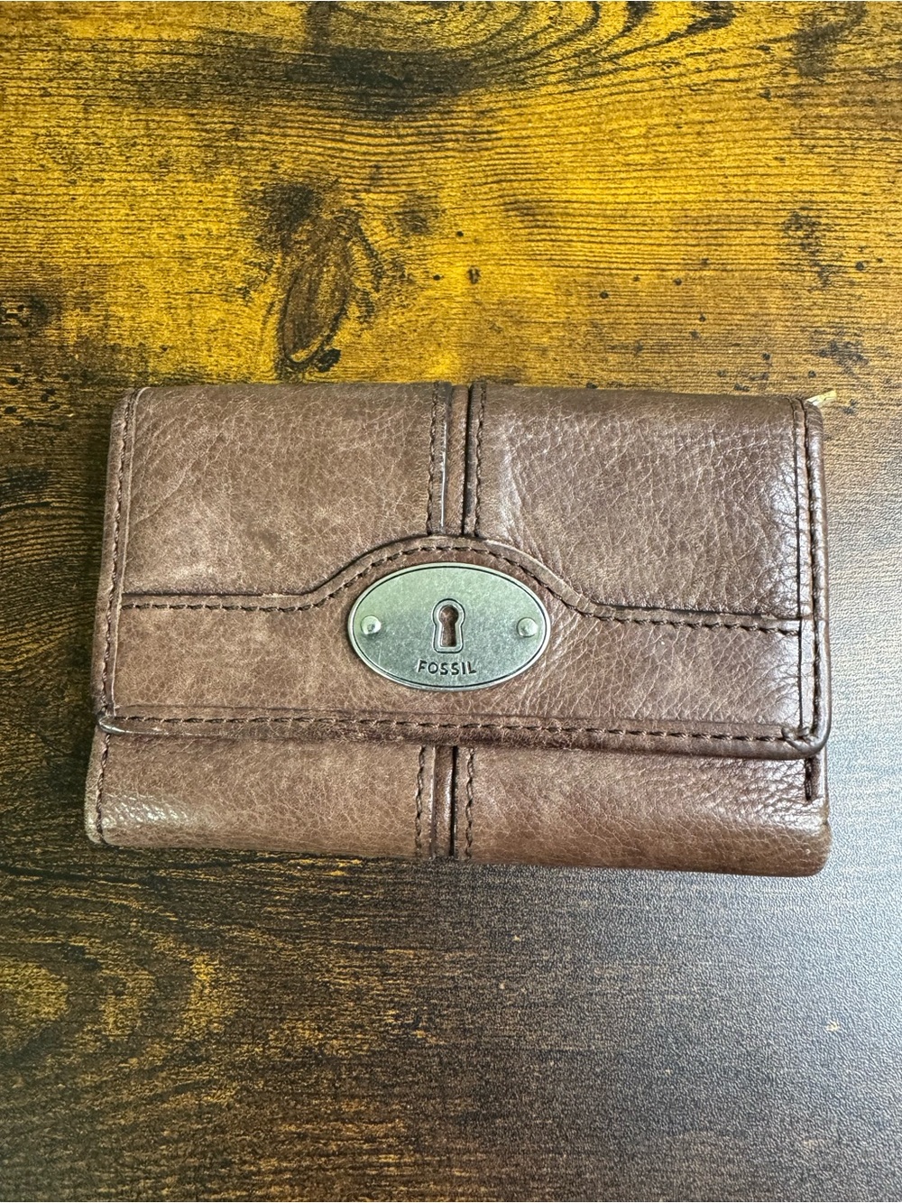 Fossil Brown Leather Trifold Wallet with Metal Keyhole Plaque